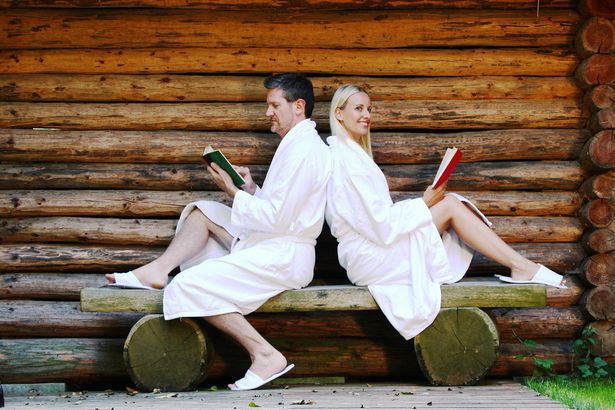 A couple in the sauna area at the HEIDE SPA Hotel & Resorts in Bad Düben