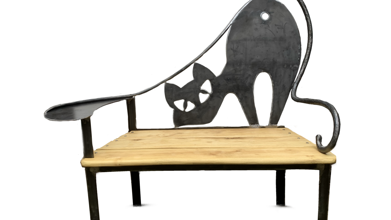 The picture shows a bench whose backrest was forged in the shape of a cat.