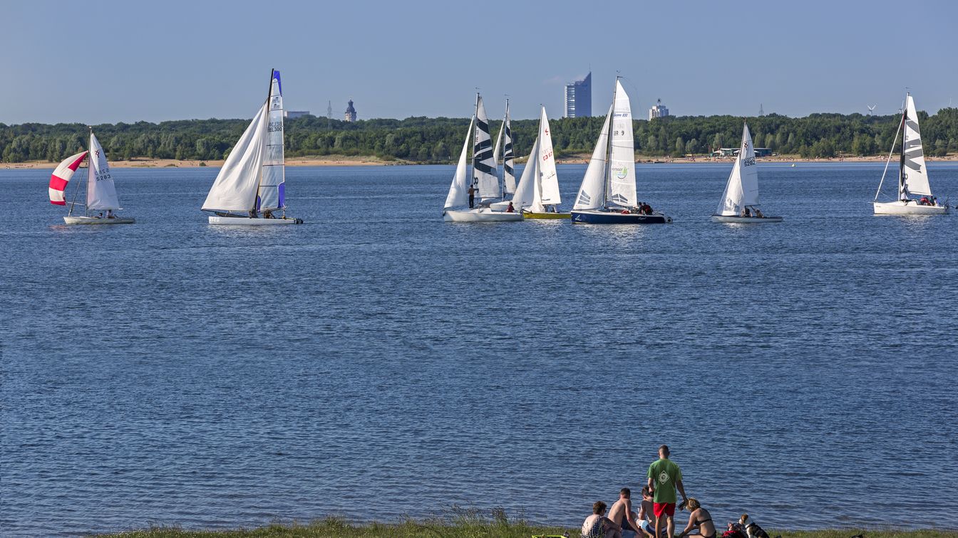 Water sports enthusiasts enjoy the trip across the water of Lake Cospuden.
